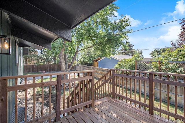 14890 W 58th Pl, Golden, CO 80403 - wooden terrace with a fenced backyard