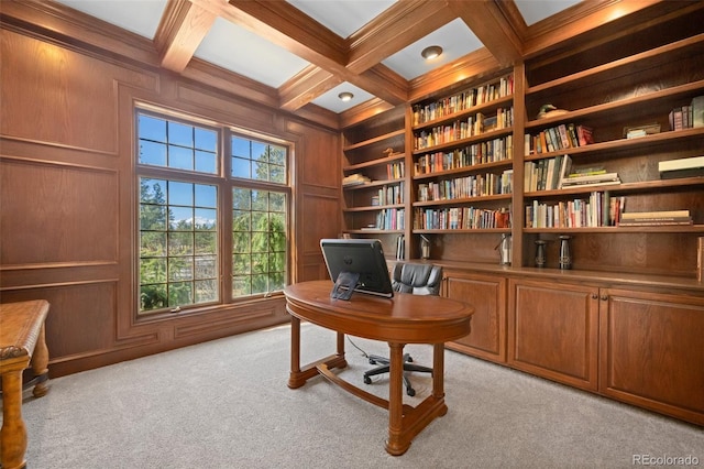 home office with beamed ceiling, coffered ceiling, light carpet, and a wealth of natural light