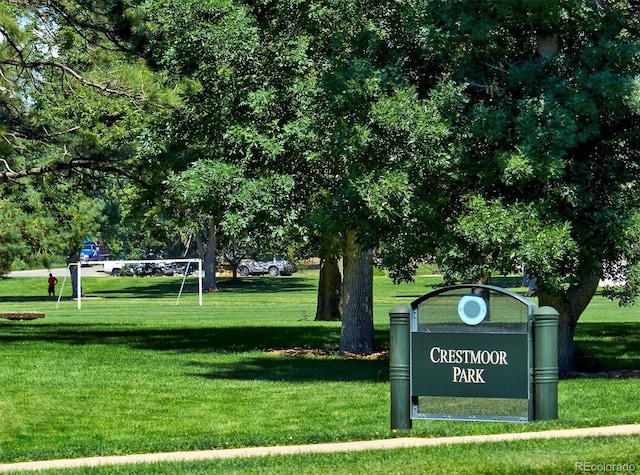 view of home's community featuring a lawn