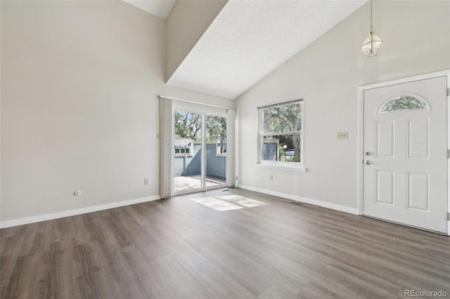 12115 Bannock St Unit B, Denver, CO 80234 - foyer entrance featuring high vaulted ceiling, wood finished floors, and baseboards
