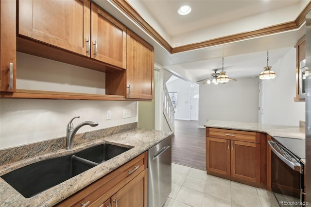 12115 Bannock St Unit B, Denver, CO 80234 - kitchen featuring appliances with stainless steel finishes, a sink, open shelves, light tile patterned floors, and brown cabinetry