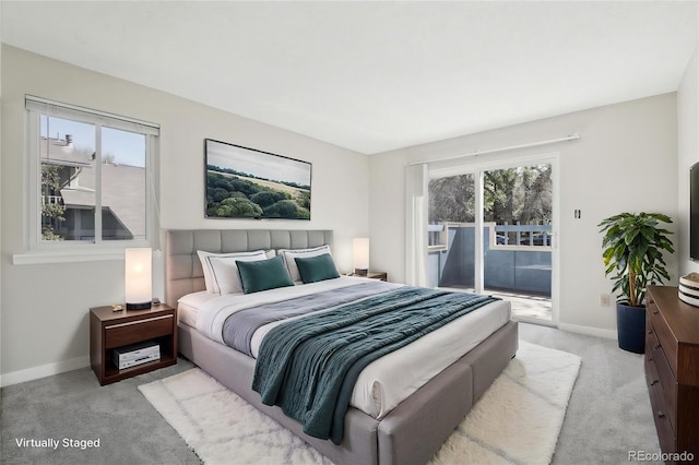 12115 Bannock St Unit B, Denver, CO 80234 - bedroom with light colored carpet, access to exterior, and baseboards