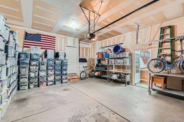 149 Jewel St, Brighton, CO 80603 - garage featuring a garage door opener