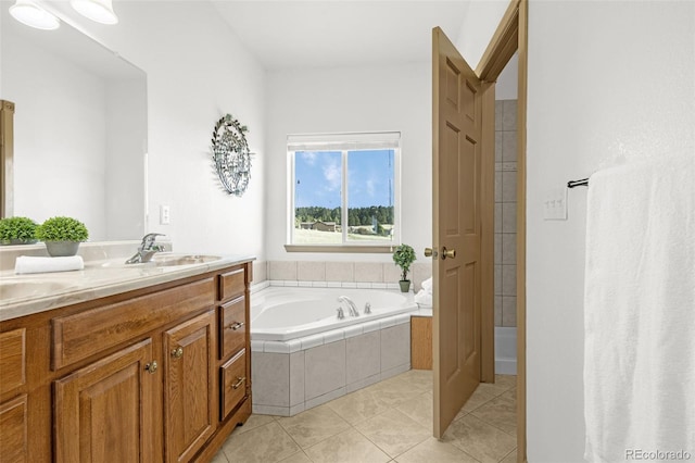 12255 Forest Green Dr, Elbert, CO 80106 - bathroom featuring tile patterned floors, a bath, and double vanity