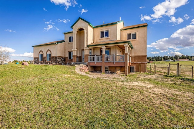12255 Forest Green Dr, Elbert, CO 80106 - back of house with stucco siding, stone siding, and central air condition unit