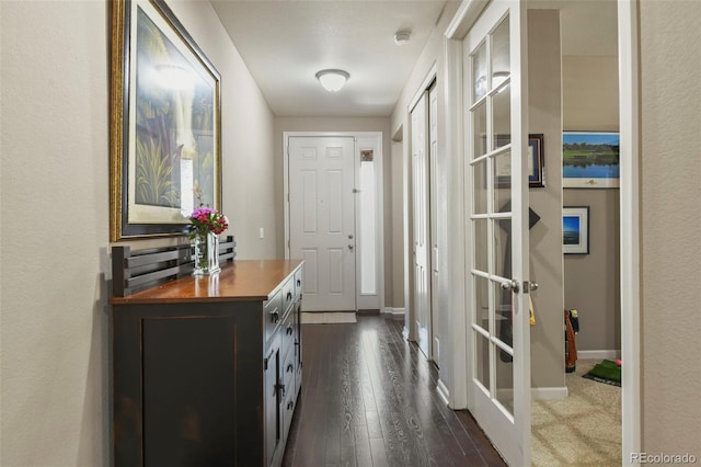 3014 E 143rd Dr, Thornton, CO 80602 - corridor featuring baseboards and dark wood-type flooring