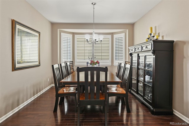 3014 E 143rd Dr, Thornton, CO 80602 - dining room featuring a chandelier and dark wood finished floors