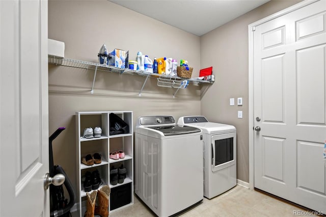 3014 E 143rd Dr, Thornton, CO 80602 - laundry area with washing machine and clothes dryer and baseboards