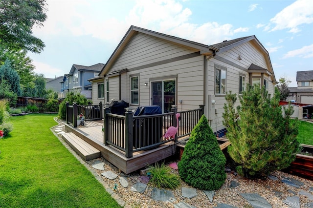 3014 E 143rd Dr, Thornton, CO 80602 - rear view of house featuring a wooden deck