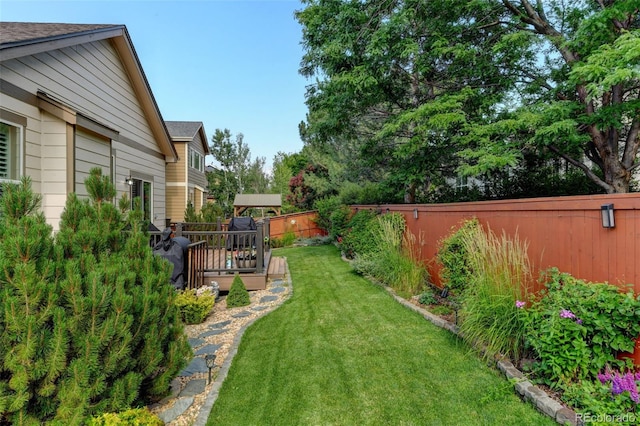 3014 E 143rd Dr, Thornton, CO 80602 - fenced backyard with a wooden deck
