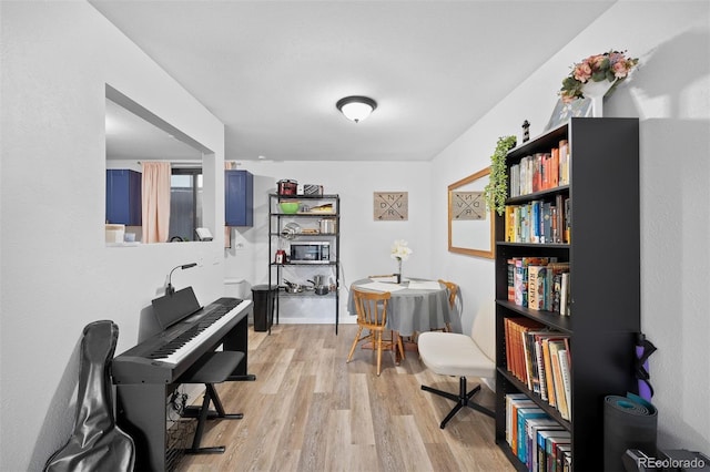 311 W Lehow Ave Unit 3, Englewood, CO 80110 - living area with light wood-style flooring