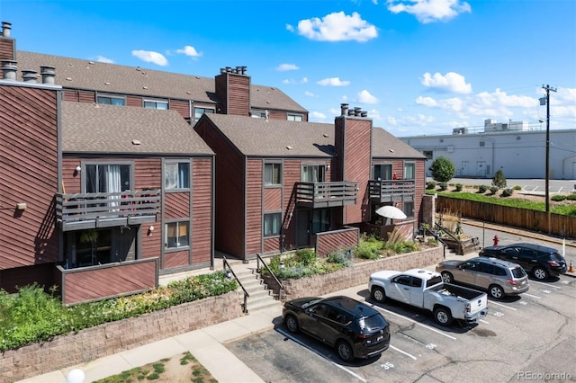 311 W Lehow Ave Unit 3, Englewood, CO 80110 - view of property with a residential view and uncovered parking