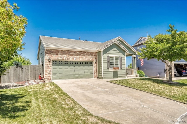 19771 E Wesley Pl, Aurora, CO 80013 - ranch-style house with driveway, brick siding, and a garage