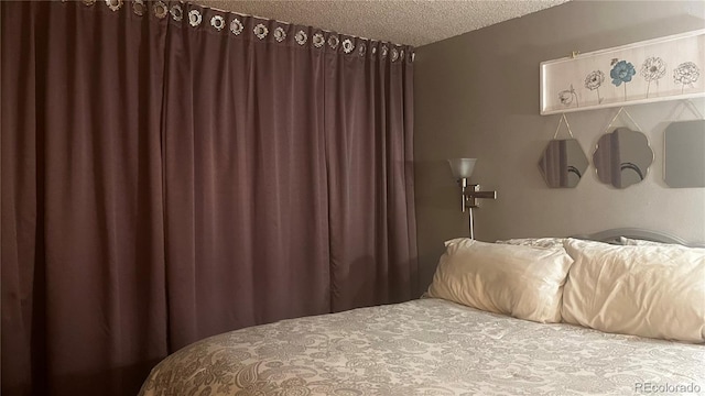 bedroom with a textured ceiling