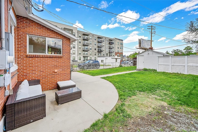 view of yard featuring a patio and fence