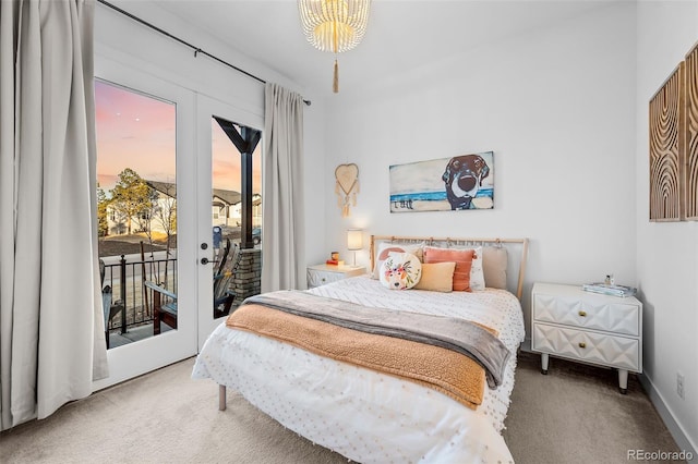 bedroom featuring french doors, baseboards, carpet, and access to outside