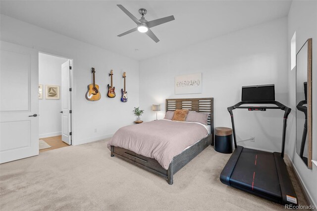 bedroom featuring baseboards, carpet, and a ceiling fan