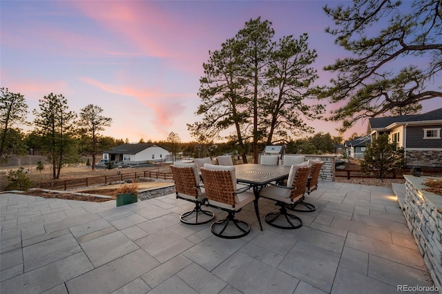 view of patio / terrace featuring outdoor dining area and fence