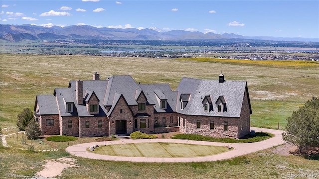 bird's eye view with a mountain view and a rural view