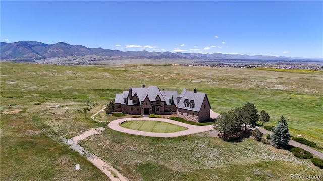 bird's eye view with a rural view and a mountain view