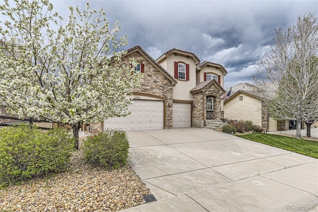 view of front of home with a garage