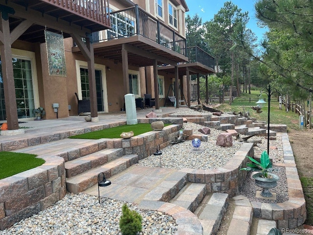 view of patio featuring a deck