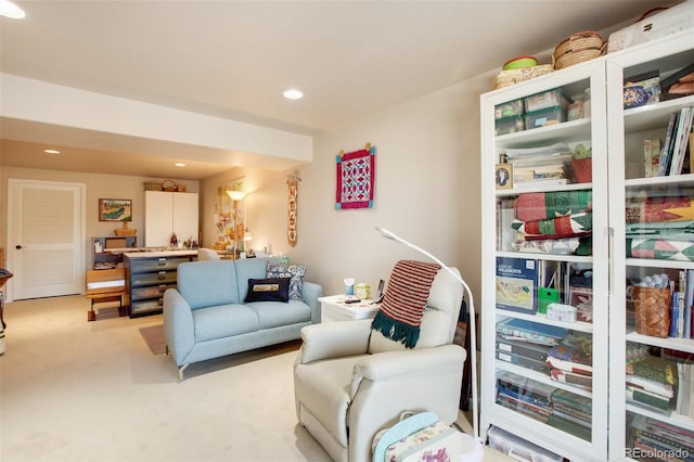 living room featuring recessed lighting and light carpet