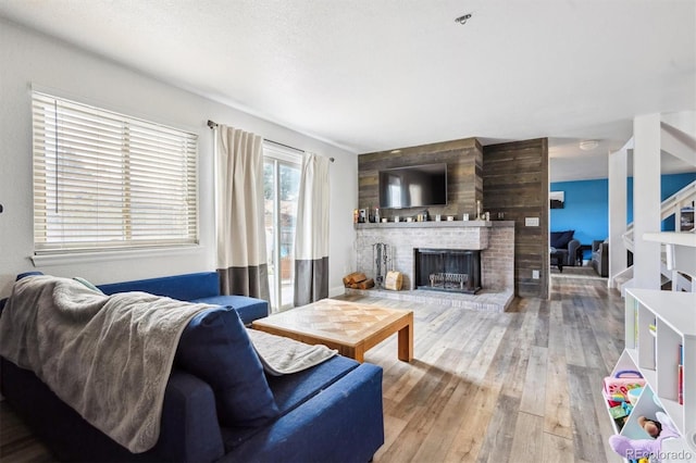 3660 S Ouray Cir, Aurora, CO 80013 - living area featuring a fireplace and wood-type flooring