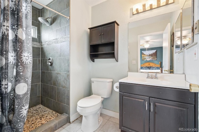 3660 S Ouray Cir, Aurora, CO 80013 - full bathroom featuring vanity, tile patterned flooring, a tile shower, and ceiling fan