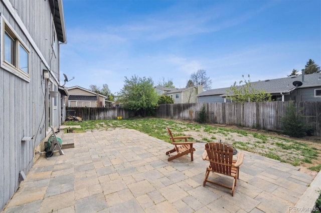 3660 S Ouray Cir, Aurora, CO 80013 - fenced backyard featuring a patio