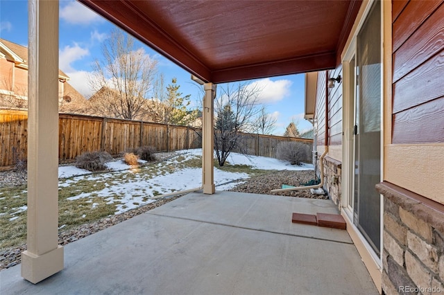 view of snow covered patio