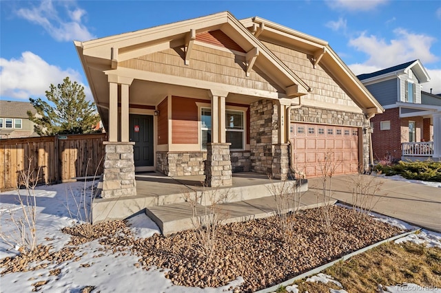 craftsman house featuring a garage and a porch