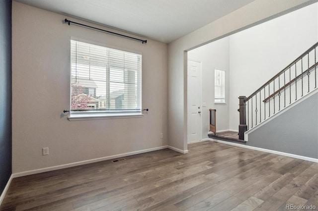 1457 Castle Creek Cir, Castle Rock, CO 80104 - entryway with plenty of natural light, wood finished floors, and stairway