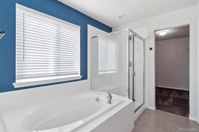 1457 Castle Creek Cir, Castle Rock, CO 80104 - full bath with a bath, a stall shower, and tile patterned flooring