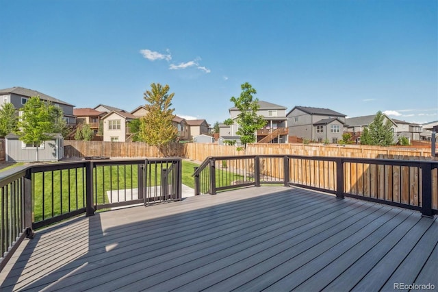 1457 Castle Creek Cir, Castle Rock, CO 80104 - wooden terrace featuring a residential view and a fenced backyard