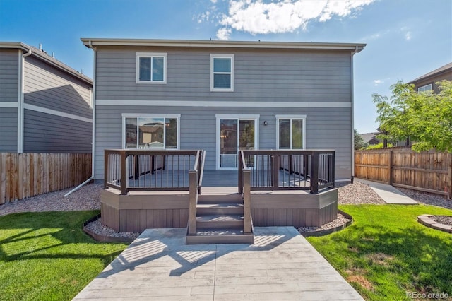 1457 Castle Creek Cir, Castle Rock, CO 80104 - rear view of property featuring a fenced backyard and a deck