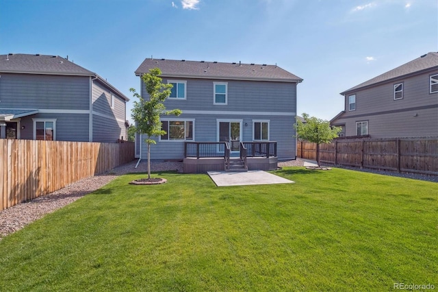 1457 Castle Creek Cir, Castle Rock, CO 80104 - back of property featuring a patio area, a fenced backyard, and a deck