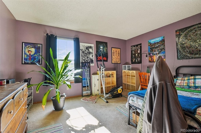 rec room featuring carpet floors and a textured ceiling
