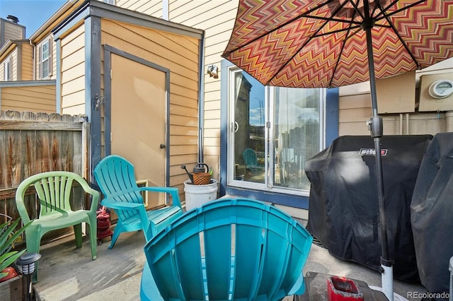 view of patio with fence