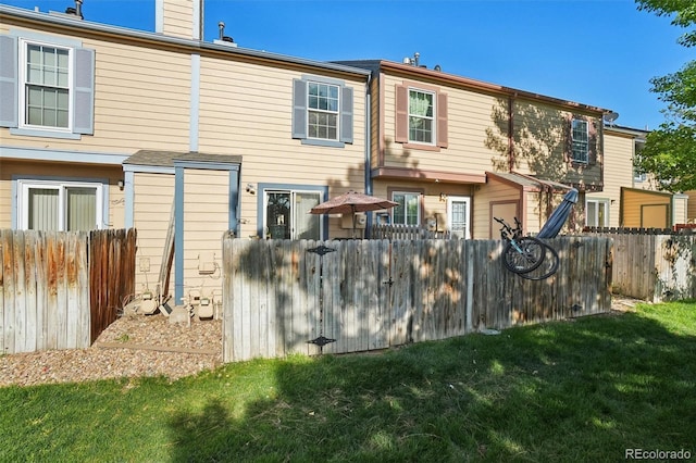rear view of property with a chimney