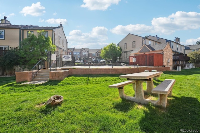 surrounding community with a residential view