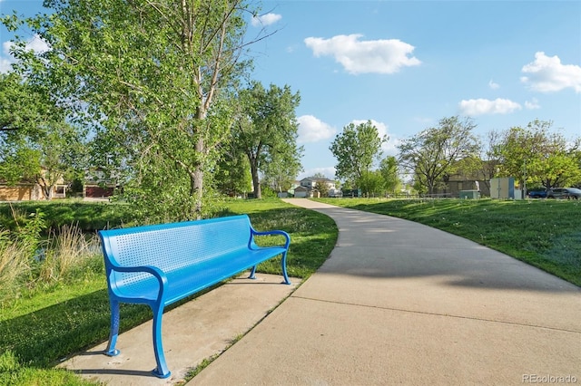 surrounding community with a yard