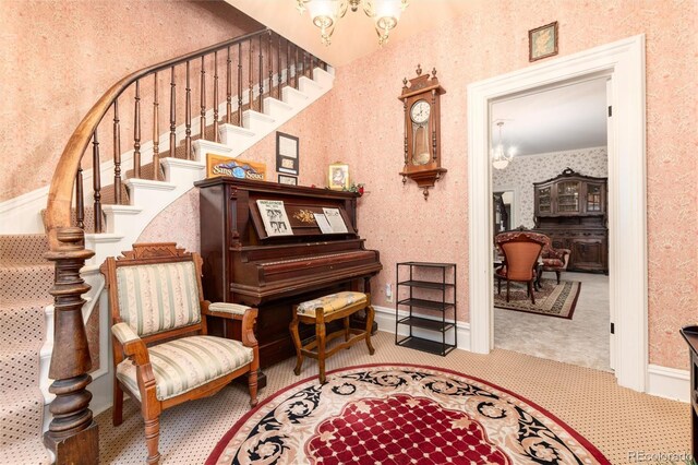 200 Rose St, Georgetown, CO 80444 - sitting room featuring stairs, carpet, a chandelier, and wallpapered walls