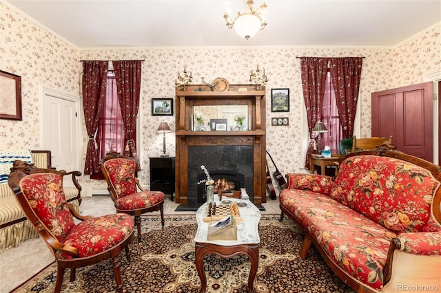 200 Rose St, Georgetown, CO 80444 - living area with wallpapered walls, crown molding, a baseboard radiator, carpet flooring, and a lit fireplace