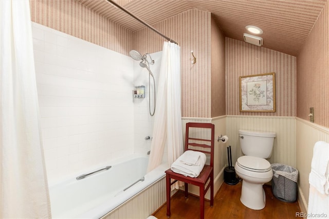200 Rose St, Georgetown, CO 80444 - full bath with wallpapered walls, wood finished floors, shower / tub combo with curtain, lofted ceiling, and wainscoting