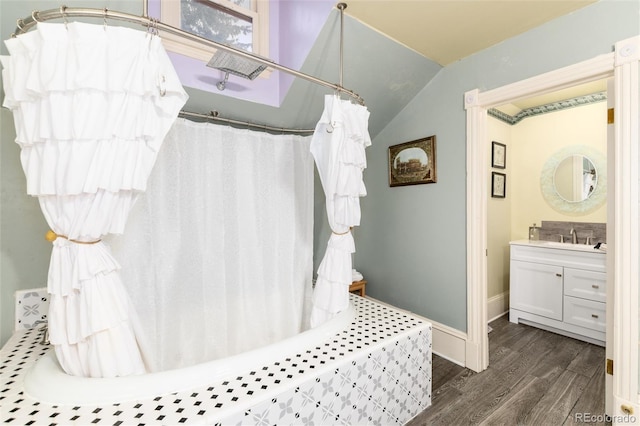 200 Rose St, Georgetown, CO 80444 - bathroom featuring vanity, wood finished floors, lofted ceiling, and curtained shower