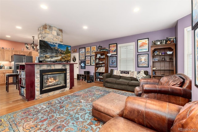 200 Rose St, Georgetown, CO 80444 - living room with light wood-type flooring, a fireplace, and recessed lighting