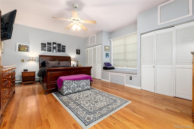 200 Rose St, Georgetown, CO 80444 - bedroom with two closets, light wood finished floors, a baseboard heating unit, and ceiling fan