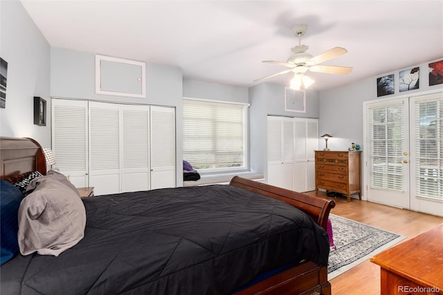 200 Rose St, Georgetown, CO 80444 - bedroom with access to exterior, french doors, wood finished floors, two closets, and ceiling fan