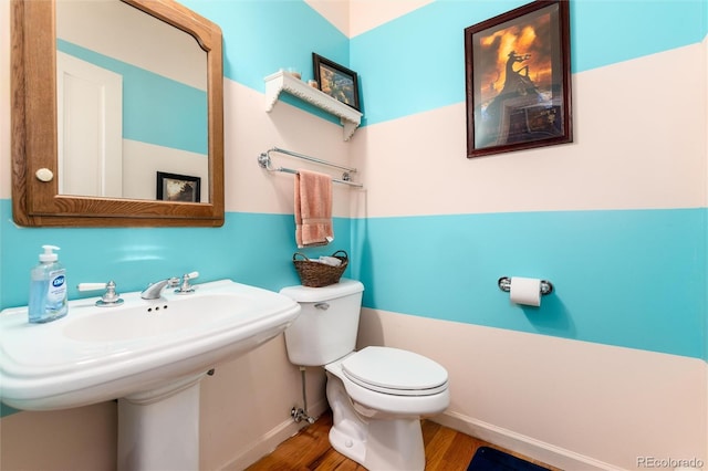 200 Rose St, Georgetown, CO 80444 - half bathroom with wood finished floors and toilet